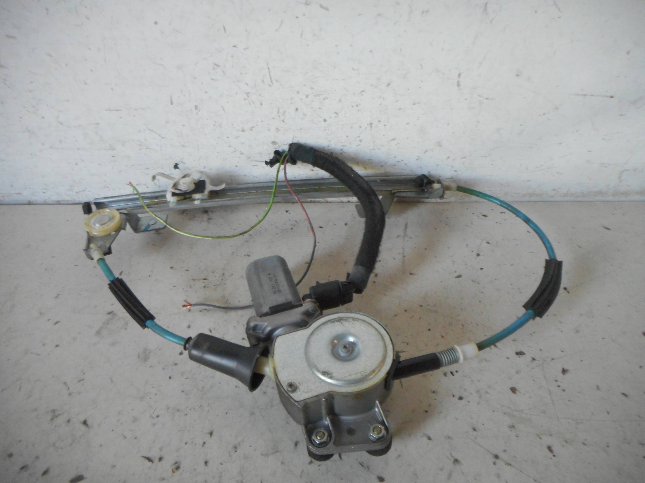 Alzacristallo elettr. porta post. sx.